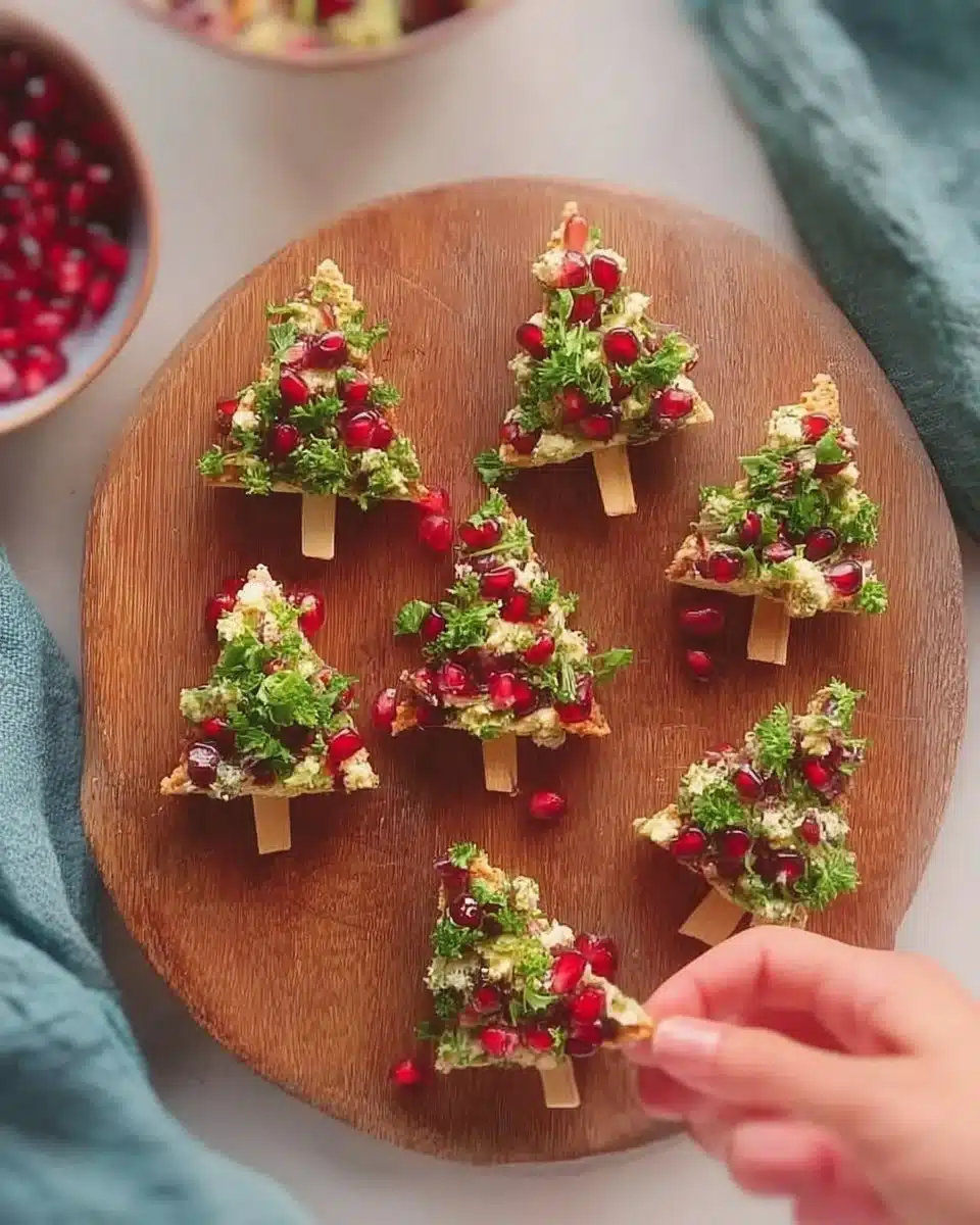 Festive Christmas tree-shaped snacks on a holiday-themed platter